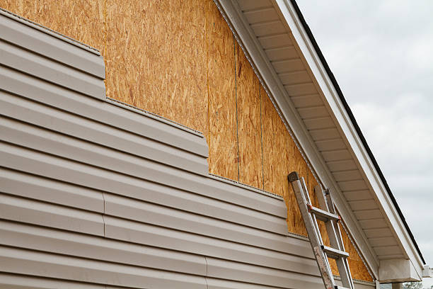 Professional Siding Contractor technician working in Dover, PA